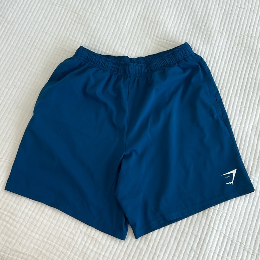 Gymshark turquoise blue shorts.